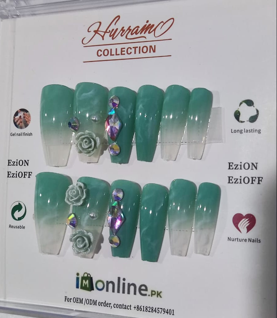 Teal gradient nail extensions with decorative elements on a display card with 'Hurrain Collection' branding.
